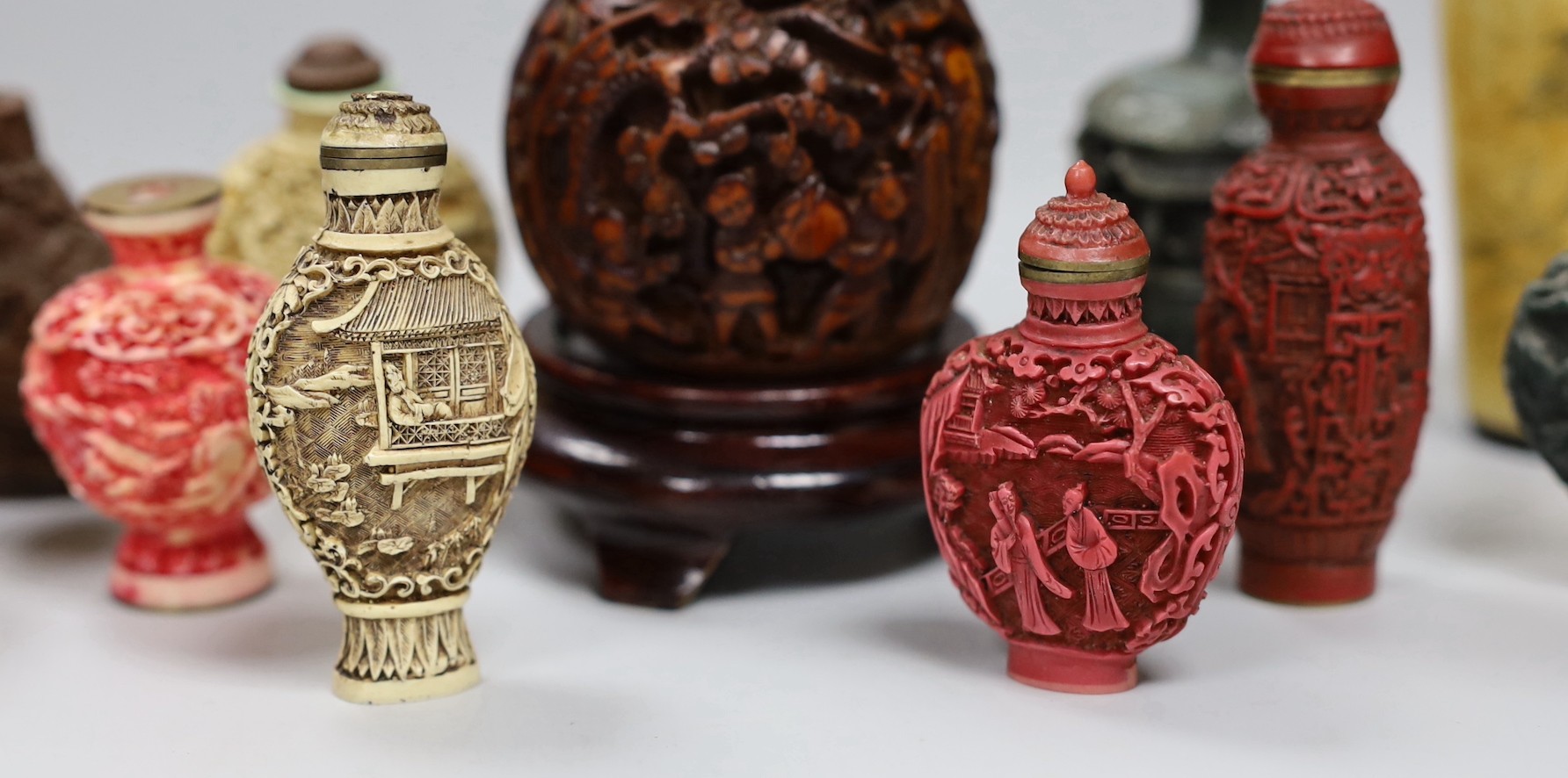 A collection of moulded resin snuff bottles